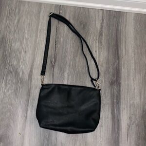 Black crossbody or shoulder medium sized adjustable purse